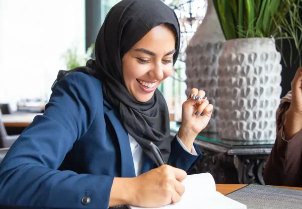 happy-businesswoman-taking-notes (1) (1) (1) (1)