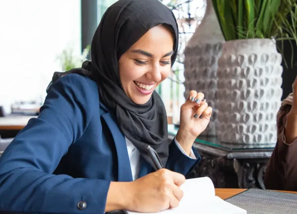 happy-businesswoman-taking-notes (1) (1) (1) (1)
